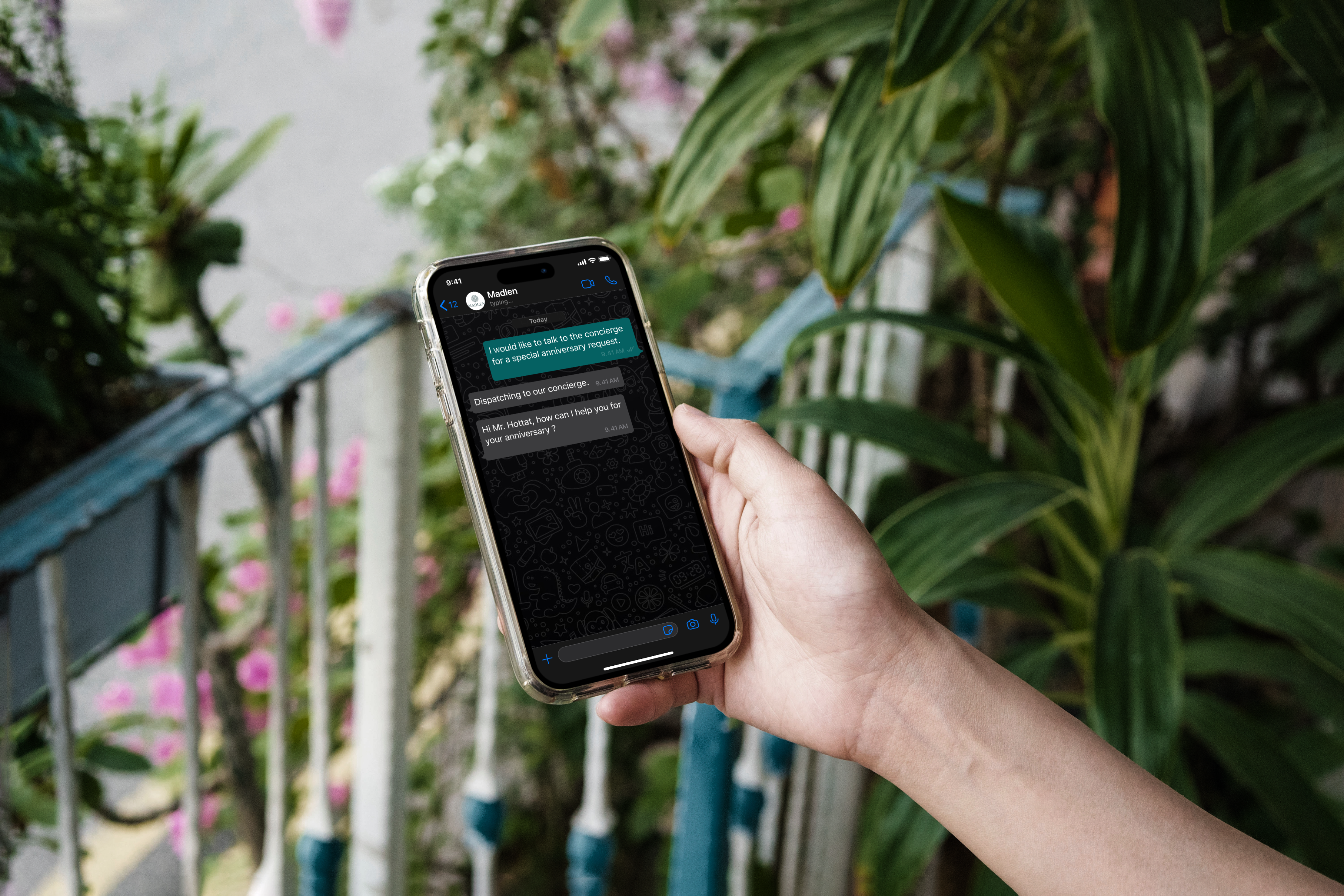 Phone showing WhatsApp hotel AI concierge with instant upsell and request automation.
